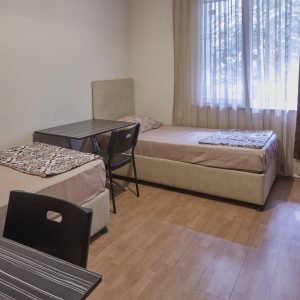 Two Person Small Garden-Facing Room