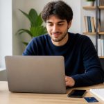 International student reviewing a dormitory reservation online